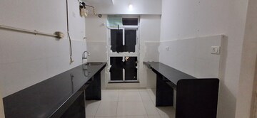Kitchen in 2 BHK Apartment at Godrej Emerald, Ghodbunder Road – for Rent