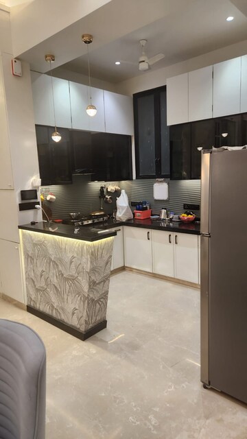 Kitchen in 2 BHK Apartment at Omkar Alta Monte, Malad East – for Rent