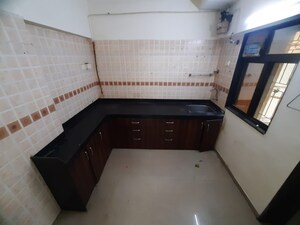 Kitchen in 1.5 BHK Apartment at Hiranandani Estate Spenta, Ghodbunder Road – for Sale