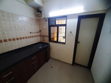 Kitchen in 1.5 BHK Apartment at Hiranandani Estate Spenta, Ghodbunder Road – for Sale
