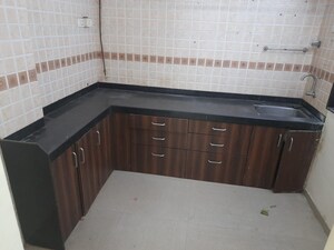 Kitchen in 1.5 BHK Apartment at Hiranandani Estate Spenta, Ghodbunder Road – for Sale