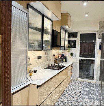 Kitchen in 3 BHK Penthouse at Raheja Vedaanta, Sector 108 – for Sale