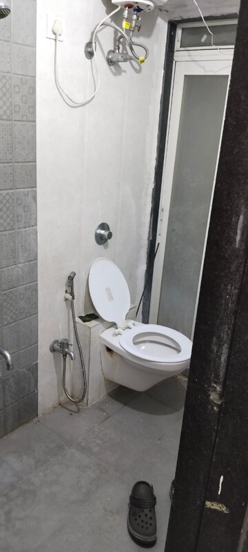 Bathroom in 2 BHK Apartment at Cosmos Orchid, Ghodbunder Road – for Rent