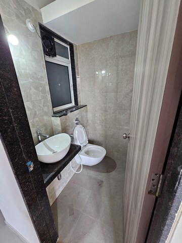 Bathroom in 1 BHK Apartment at Ashar Axis, Majiwada – for Rent