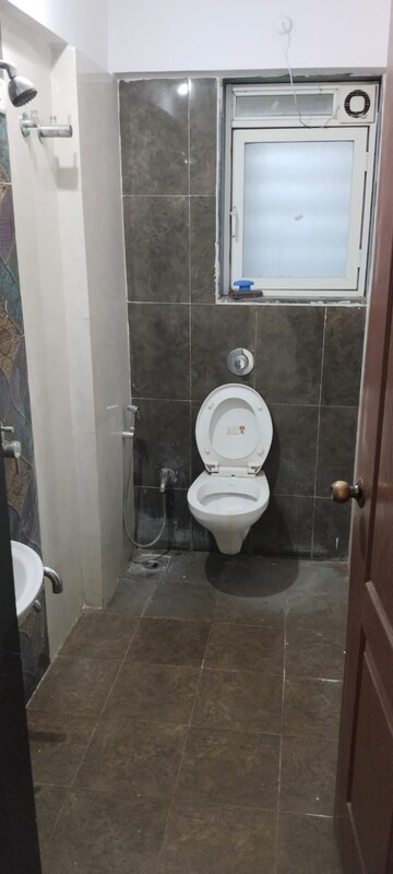 Bathroom in 1 BHK Apartment at Cosmos Orchid, Ghodbunder Road – for Rent