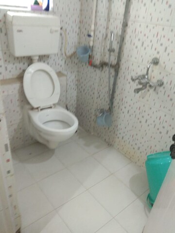 Bathroom in 2 BHK Apartment at Rohan Prarthana, Kothrud – for Rent