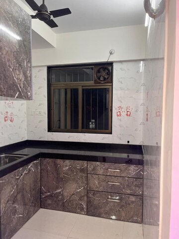 Kitchen in 1 BHK Apartment at Chandak Nishchay, Ratan Nagar – for Sale