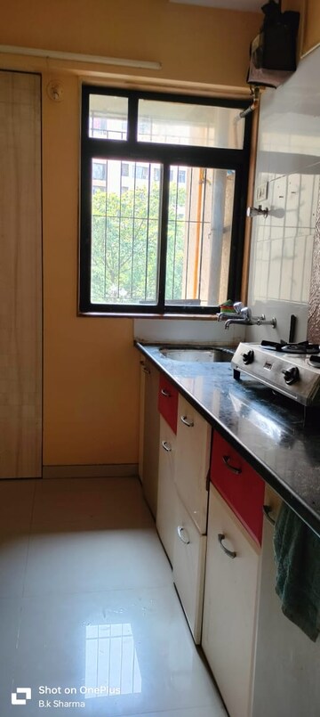 Kitchen in 1 BHK Apartment at Vijay Nagari Annex, Waghbil – for Rent