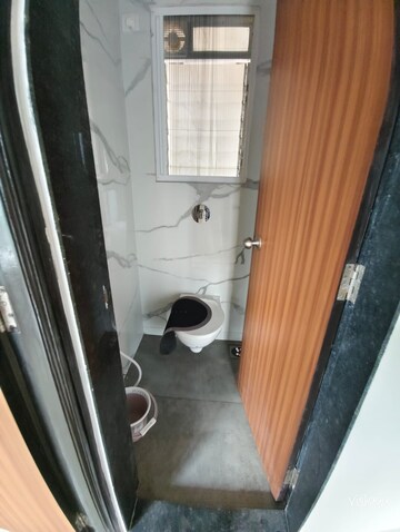 Bathroom in 1 BHK Apartment at Raunak Bliss, Ghodbunder Road – for Rent