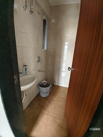 Bathroom in 1 BHK Apartment at Raunak Bliss, Ghodbunder Road – for Rent