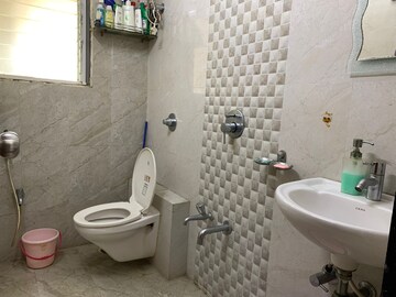 Bathroom in 2 BHK Apartment at Cosmos Enclave, Kasarvadavali – for Rent