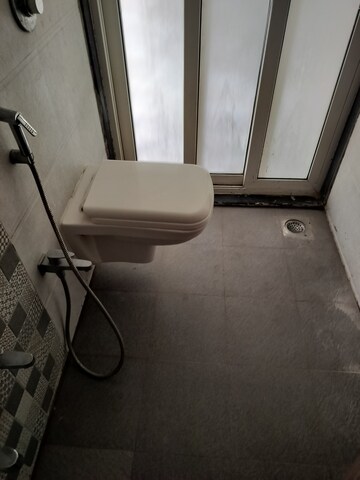 Bathroom in 2 BHK Apartment at Cosmos Orchid, Ghodbunder Road – for Rent