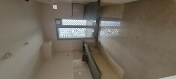 Kitchen in 2 BHK Apartment at Piramal Vaikunth, Balkum Pada – for Rent