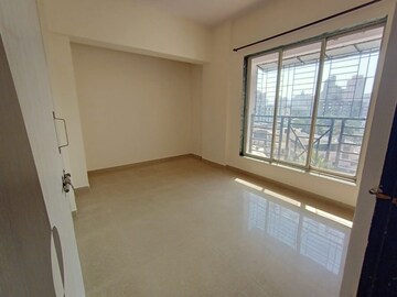 Bedroom in 1 BHK Apartment at Gurukrupa Labh CHS, Koliwada – for Sale