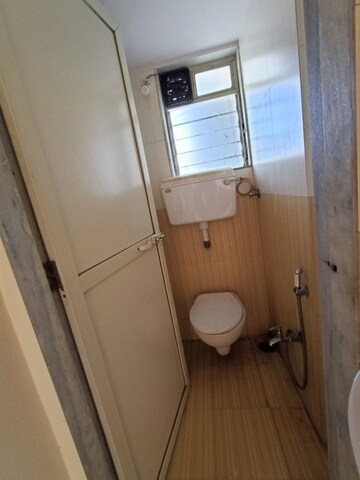 Bathroom in 1 BHK Apartment at Gurukrupa Labh CHS, Koliwada – for Sale