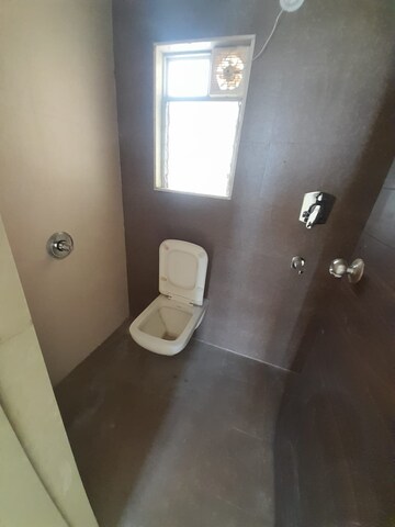 Bathroom in 1 BHK Apartment at Hari Manan Heights A Wing, Kavesar – for Rent