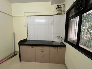 Kitchen in 1 BHK Apartment at Vijay Vatika, Kavesar – for Sale