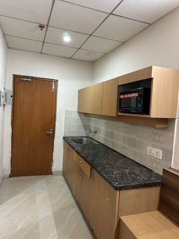 Kitchen in 1 BHK Apartment at Paramount Golfforeste, Zeta I Greater Noida – for Rent