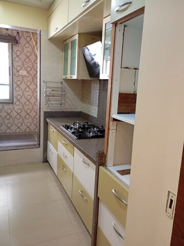 Kitchen in 2.5 BHK Apartment at Neelkanth Greens, Manpada – for Rent