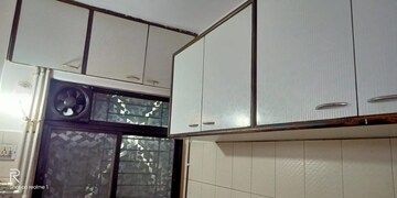 Kitchen in 1 BHK Apartment at Sukur Residency B1 CHS Ltd, Kasarvadavali – for Sale