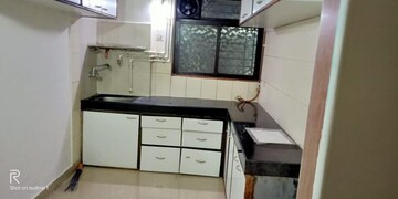 Kitchen in 1 BHK Apartment at Sukur Residency B1 CHS Ltd, Kasarvadavali – for Sale