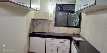 Kitchen in 1 BHK Apartment at Sukur Residency B1 CHS Ltd, Kasarvadavali – for Sale