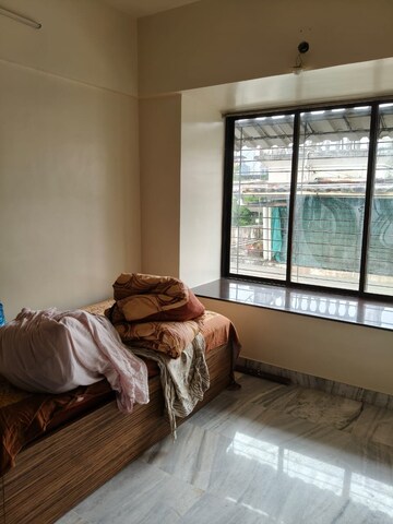 Bedroom in 2 BHK Apartment at Garden Avenue, Nerul Sector 21 – for Rent
