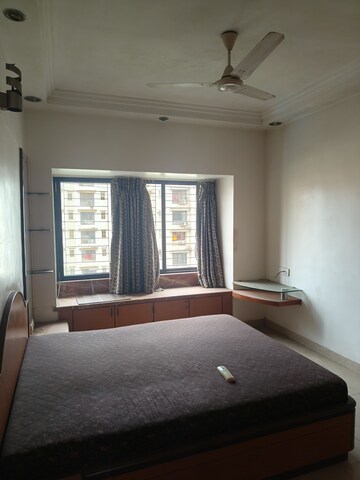 Bedroom in 3 BHK Apartment at K Rahega Palm Springs, Malad West – for Rent