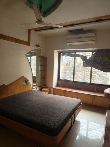 Bedroom in 3 BHK Apartment at K Rahega Palm Springs, Malad West – for Rent
