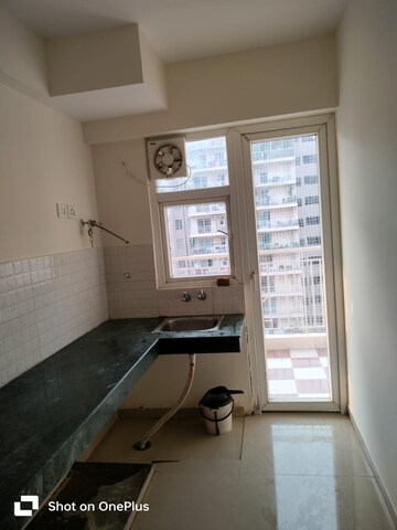 Kitchen in 2 BHK Apartment at Shree Vardhman Green Court, Sector 90 – for Sale