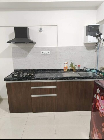 Kitchen in 1 RK Apartment at Gera World of Joy, Kharadi – for Rent