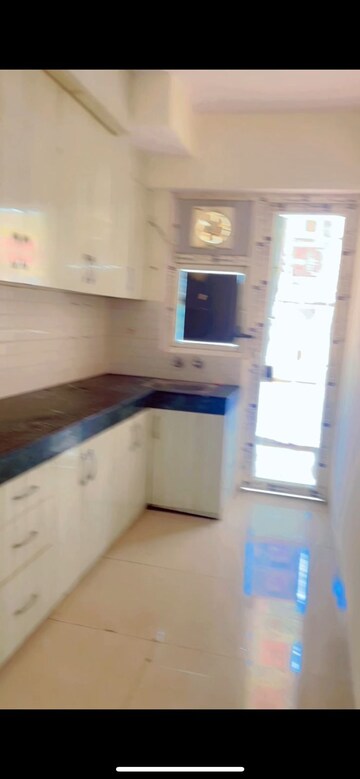 Kitchen in 2 BHK Apartment at Shree Vardhman Green Court, Sector 90 – for Rent