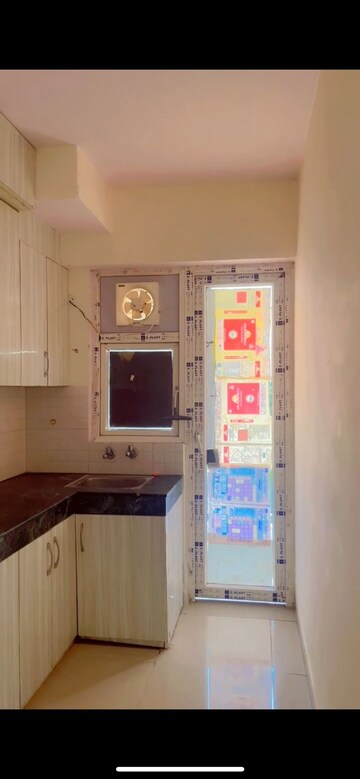 Kitchen in 2 BHK Apartment at Shree Vardhman Green Court, Sector 90 – for Rent