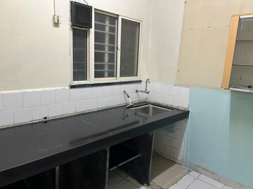 Kitchen in 1 BHK Apartment at Neptune Society, Kalyani Nagar – for Rent