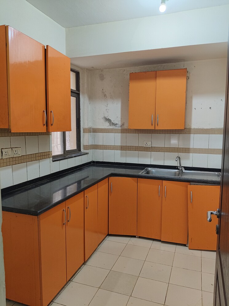 Kitchen, unitech-uniworld-gardens-2 1.5 Bedroom 725 Sq.Ft. Apartment In Sector 47 Gurgaon 9007591