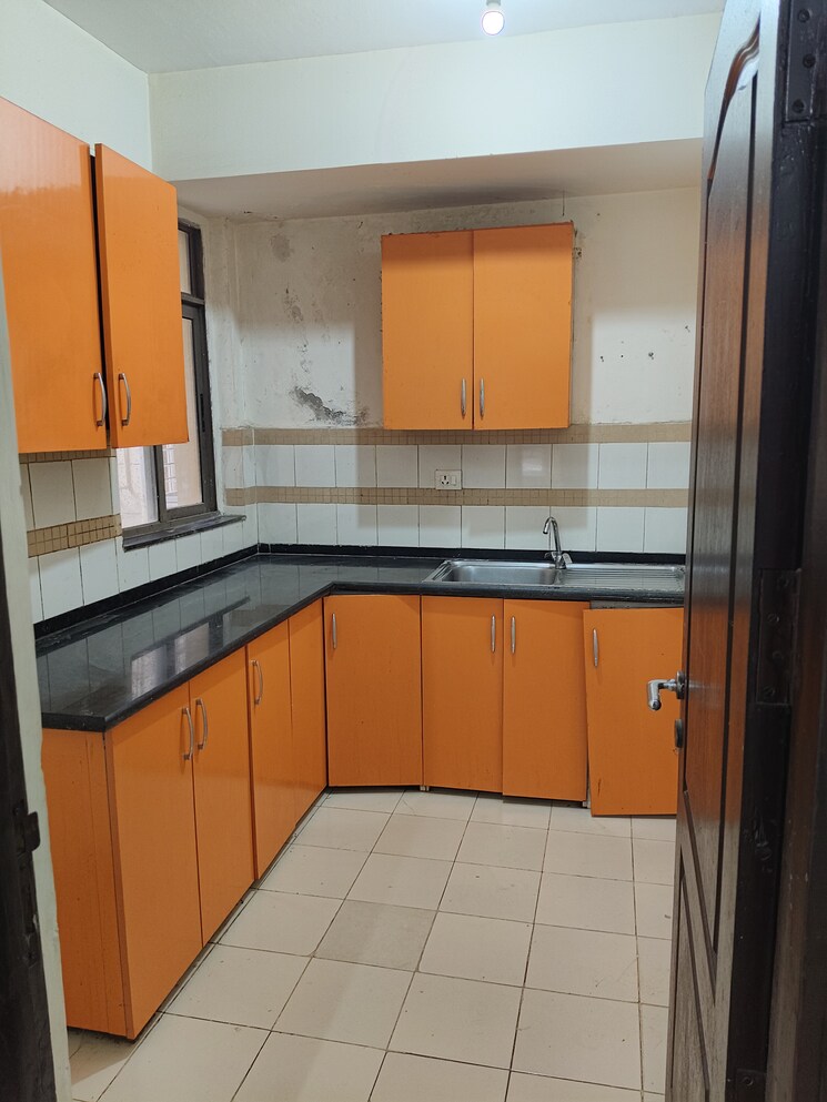 Kitchen, unitech-uniworld-gardens-2 1.5 Bedroom 725 Sq.Ft. Apartment In Sector 47 Gurgaon 9007591