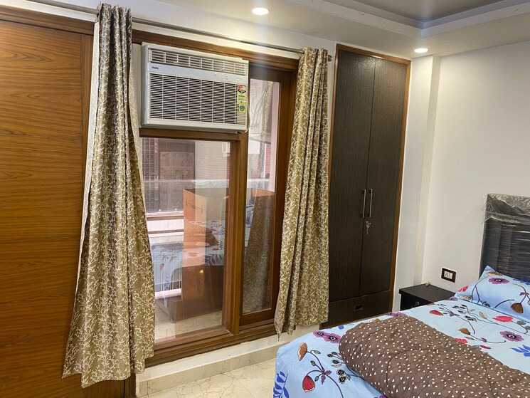 Bedroom, vasant kunj enclave 3 Bedroom 1050 Sq.Ft. Builder Floor In Vasant Kunj Enclave Delhi 9007894