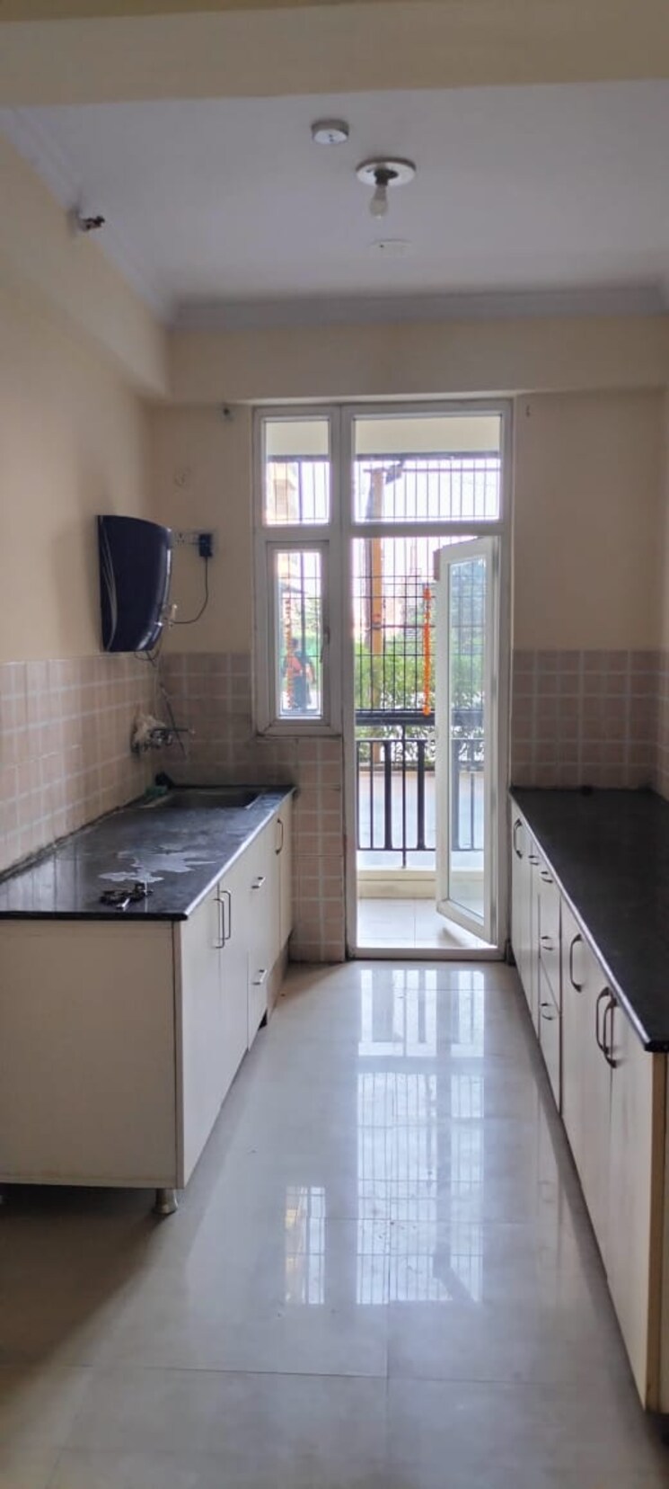 Kitchen, saviour-greenisle 2 Bedroom 1150 Sq.Ft. Apartment In Sain Vihar Ghaziabad 9007938