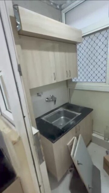 Kitchen in 2 BHK Apartment at Shri Radha Sky Gardens, Sector 16b Greater Noida – for Rent