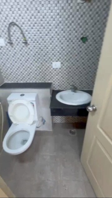 Bathroom in 2 BHK Apartment at Shri Radha Sky Gardens, Sector 16b Greater Noida – for Rent