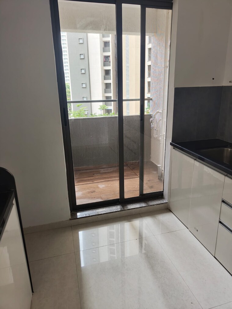 Kitchen, pride-world-city-wellington 3 Bedroom 1156 Sq.Ft. Apartment In Charholi Budruk Pune 9008024