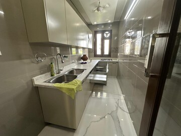 Kitchen in 1.5 BHK Apartment at RWA Qutab Enclave, Katwaria Sarai – for Rent
