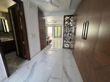 Building Lobby in 1.5 BHK Apartment at RWA Qutab Enclave, Katwaria Sarai – for Rent