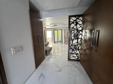 Building Lobby in 1.5 BHK Apartment at RWA Qutab Enclave, Katwaria Sarai – for Rent