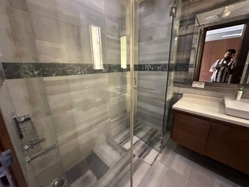 Bathroom in 1.5 BHK Apartment at RWA Qutab Enclave, Katwaria Sarai – for Rent