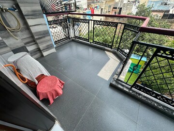 Balcony in 1.5 BHK Apartment at RWA Qutab Enclave, Katwaria Sarai – for Rent