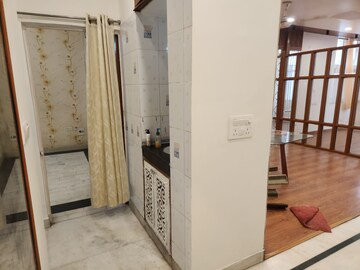 Building Lobby in 2 BHK Apartment at RWA Qutab Enclave, Katwaria Sarai – for Rent