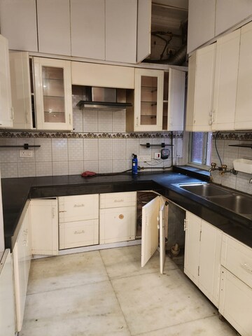 Kitchen in 2 BHK Apartment at RWA Qutab Enclave, Katwaria Sarai – for Rent