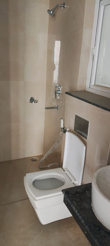 Bathroom in 3 BHK Apartment at Rishita Manhattan, Gomti Nagar – for Rent