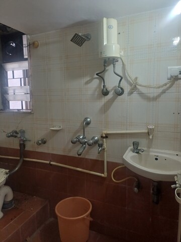 Bathroom in 1 BHK Apartment at Jyoti Complex, Goregaon East – for Rent